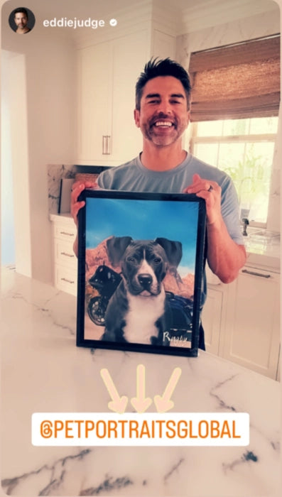 Man holding a custom portrait of his dog