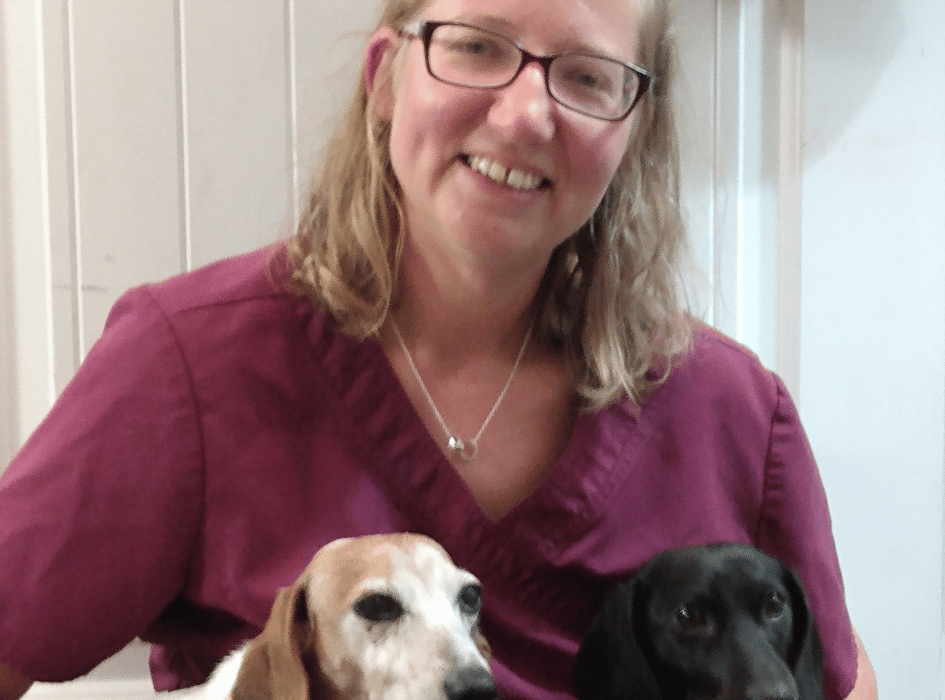 Dr. Kelly Hood with two dogs
