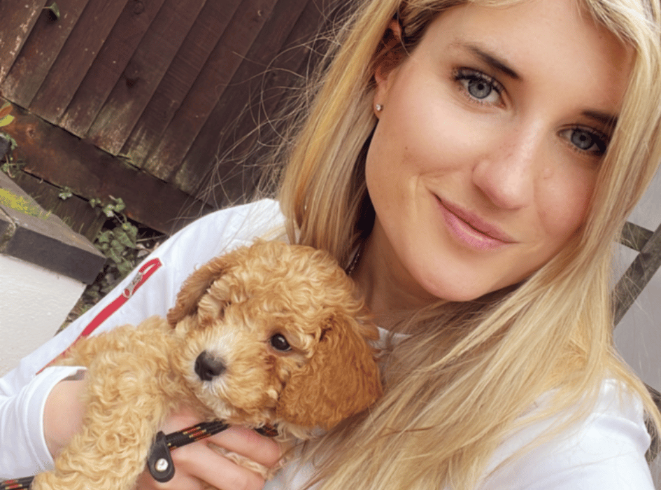 Olivia holding a puppy