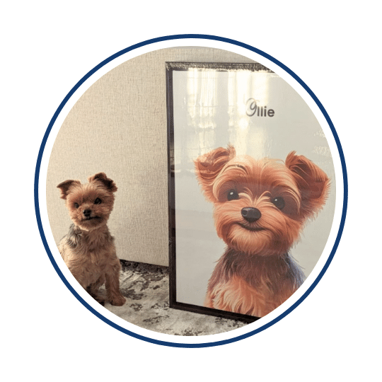Small dog sitting next to its custom portrait